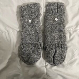 A pair of Express mitten.